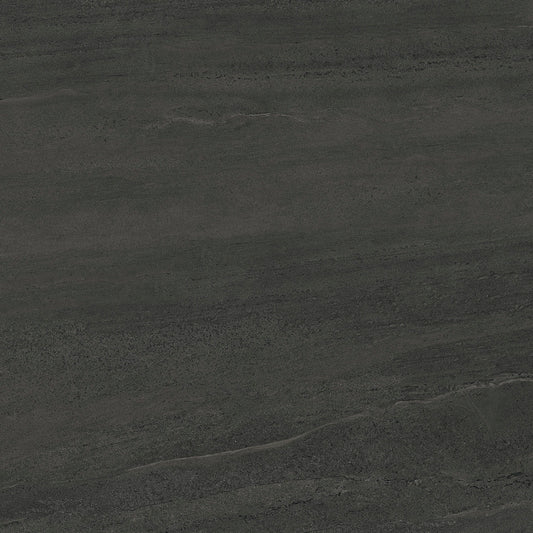 Dark charcoal gray stone or concrete texture with subtle natural tonal variation and fine surface striations.