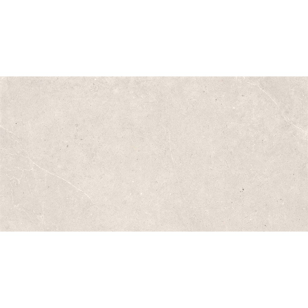 A rectangular beige stone-look tile with subtle natural veining, centered on a white background.