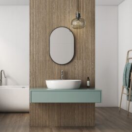 Borneo Honey Slatted Wall Panels as a feature in a bathroom with a floating sink and oval mirror