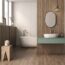 a bathroom with a tub and a sink featuring Borneo Slatted Oak Wall Panels