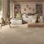 Taxos Sand Limestone Effect Tiles in a lovely calm beige living room. L shaped sofa and easy chair.