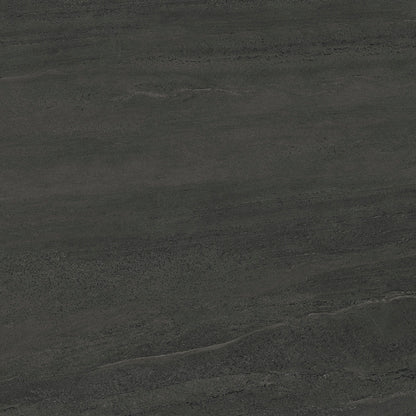 Dark charcoal gray stone or concrete texture with subtle natural tonal variation and fine surface striations.