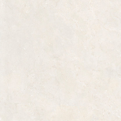 A close-up of a light warm off-white textured surface with subtle beige and cream marbling, filling the entire frame.